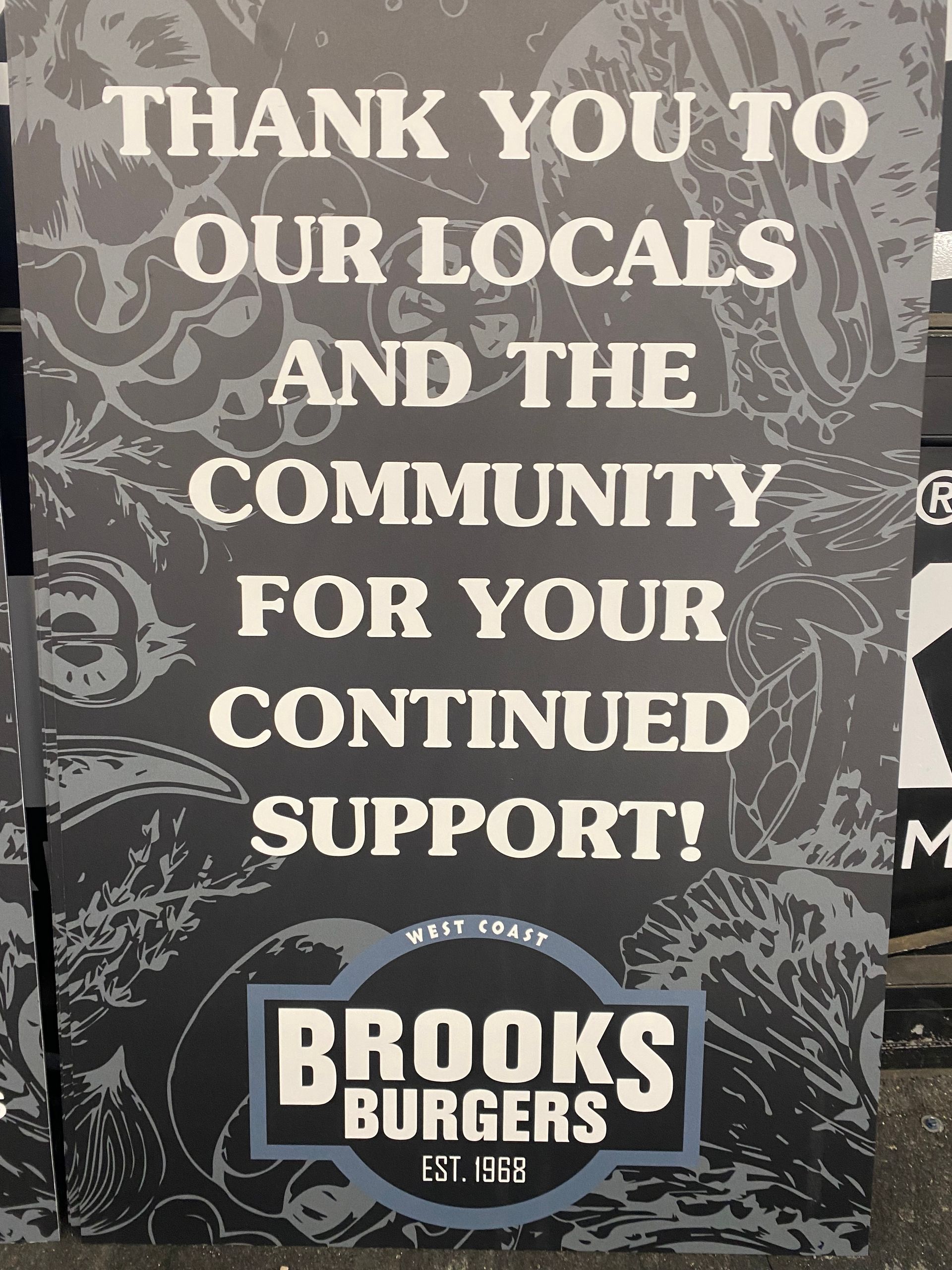 Brooks Burgers sign thanking locals and the community for their continued support
