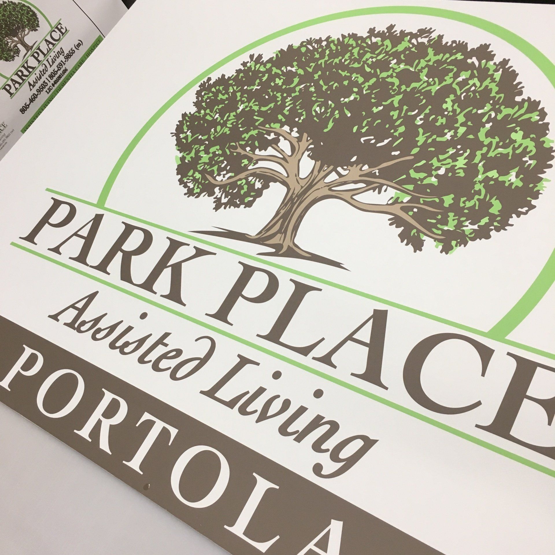 Park Place Assisted Living Portola logo with a green tree and beige-gray text