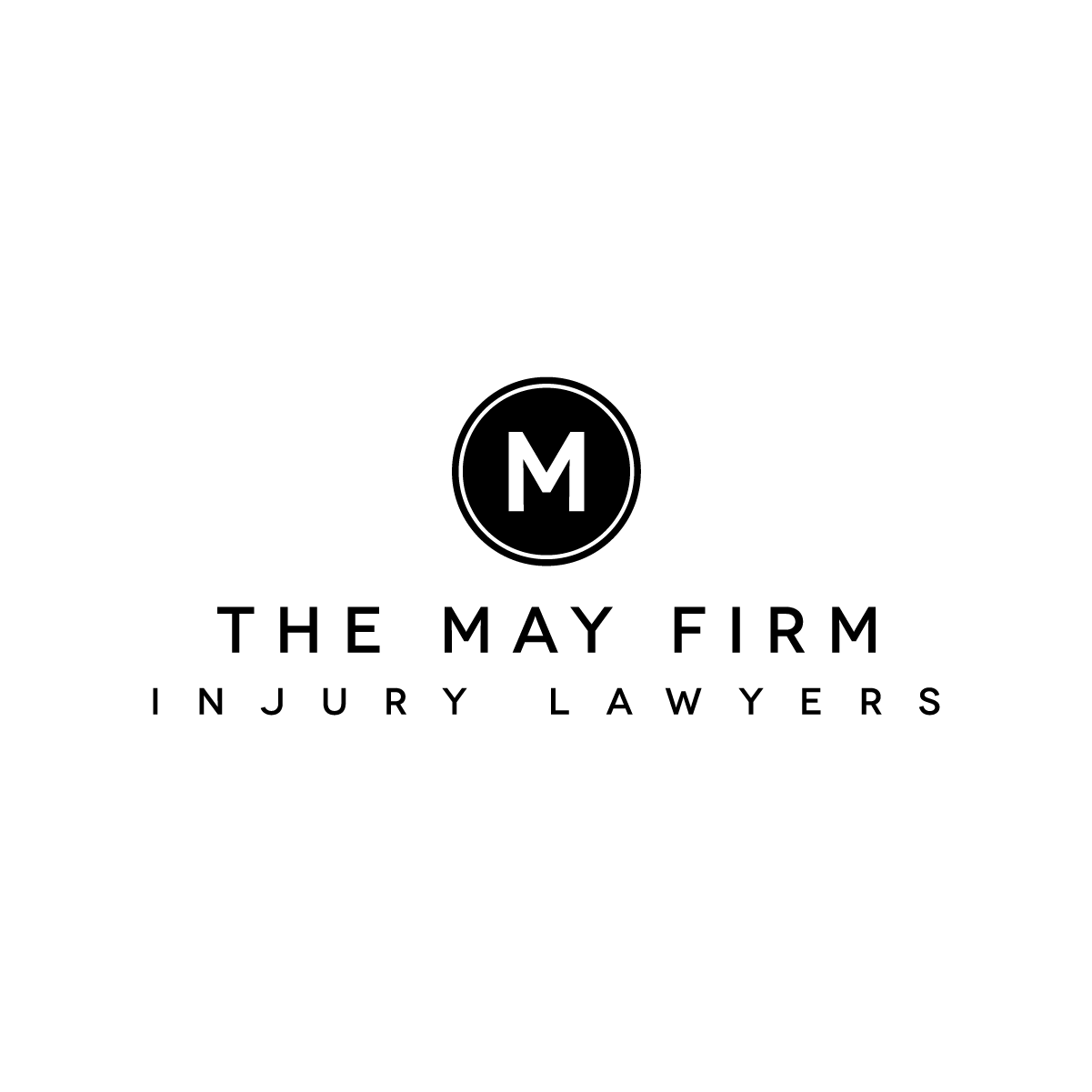 The May Firm Injury Lawyers logo with a black circle and white “M” on a white background