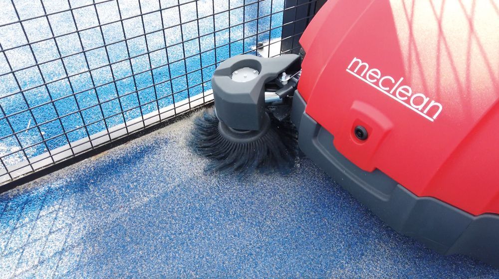 Meclean professional walk-behind sweeper battery powered Buster 750 Pro sweeping edges padel court