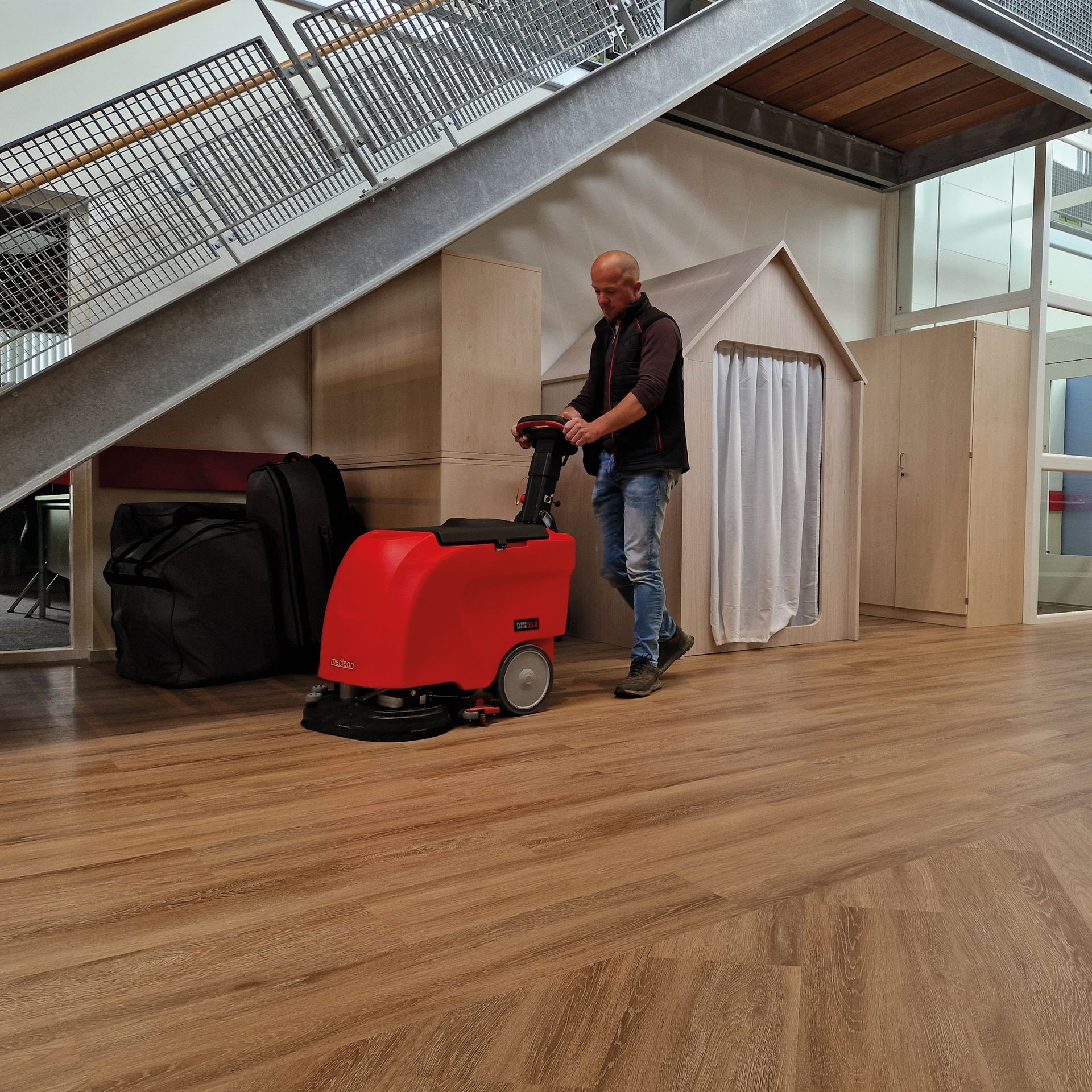 Meclean walk-behind scrubber-dryer POWERSCRUB 50.8 on wood floor