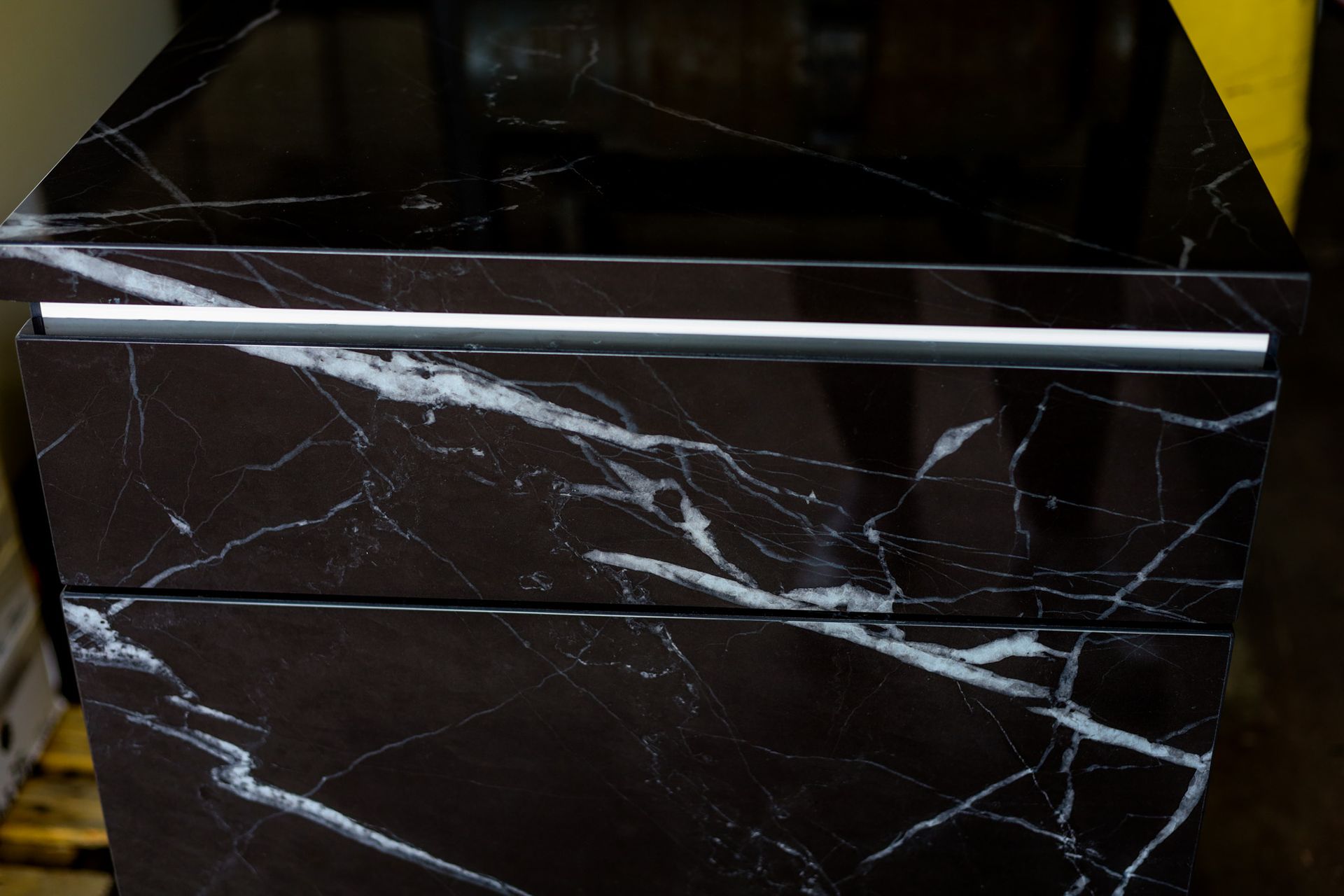 Custom black and white porcelain cabinetry