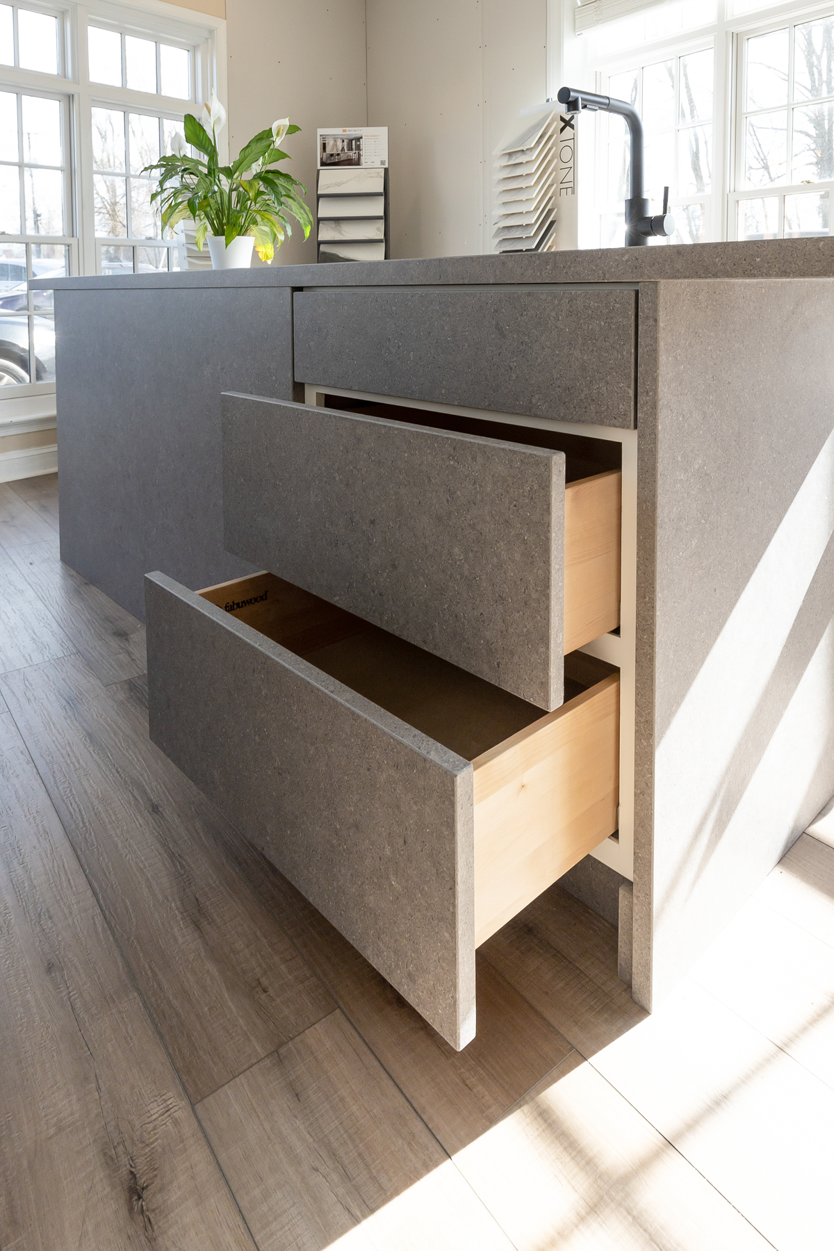 Kone Grey by Atlas Plan large fomat porcelain drawer fronts matching countertops and sides of island