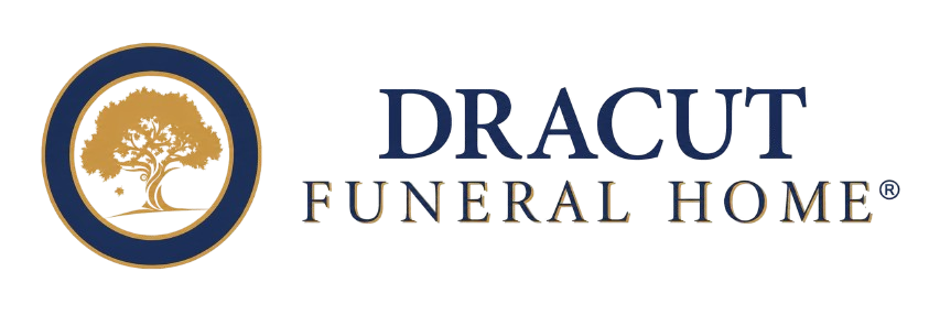 Dracut Funeral Home logo with gold tree emblem and blue text on a white background