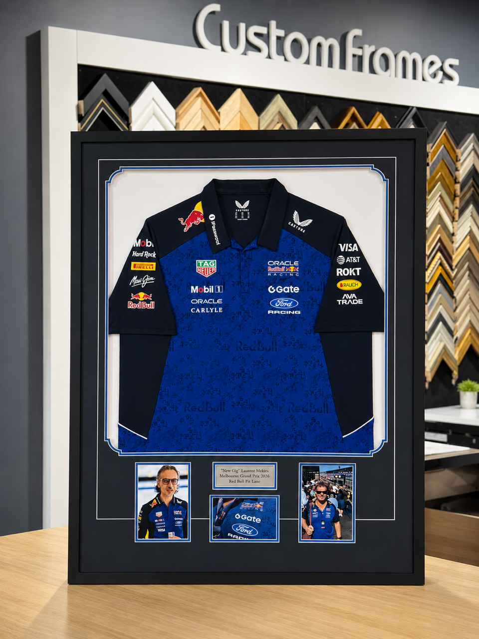 Black picture frame with a sample photo and “malden” text on a white insert.