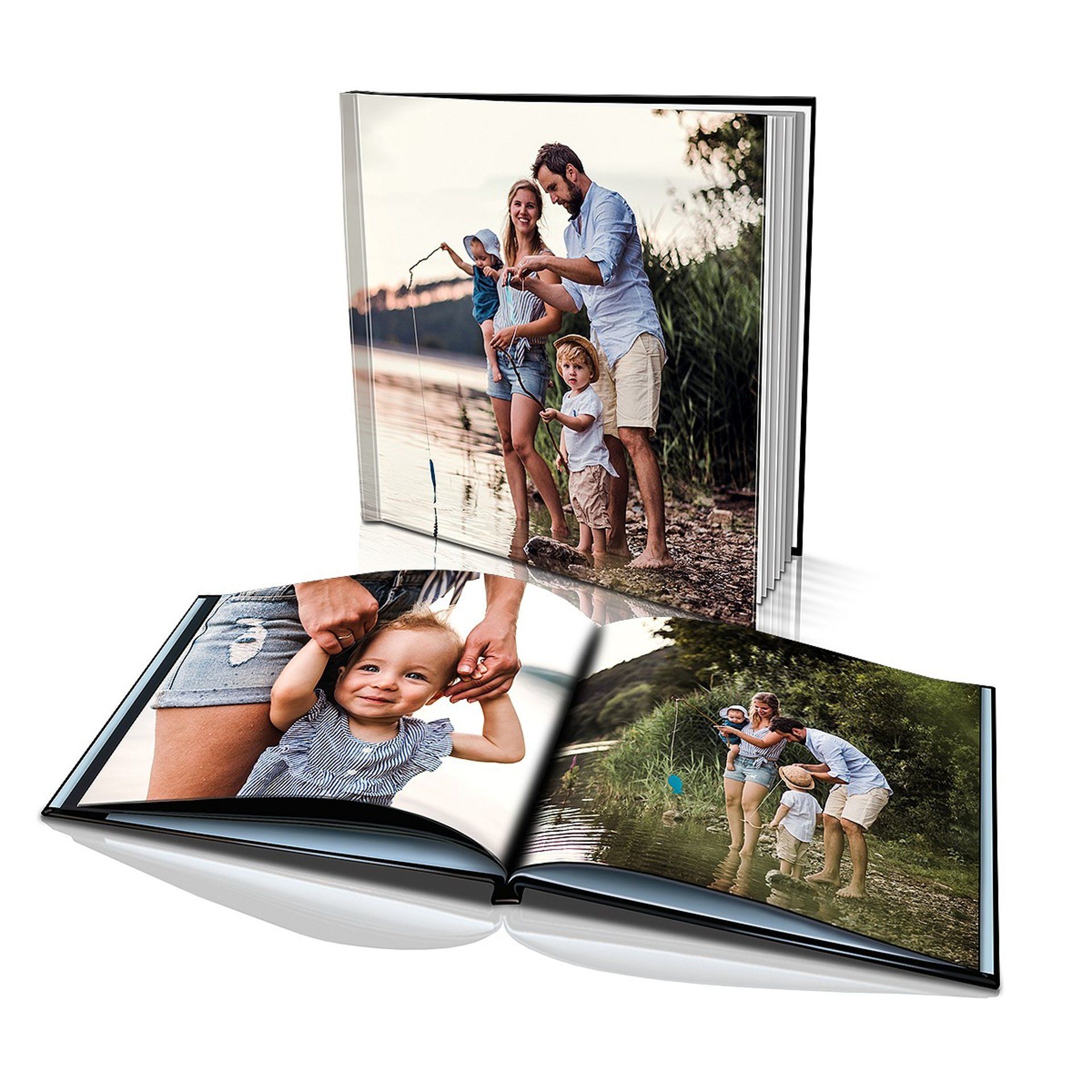 Open photo book with family portraits on a beach and in a grassy field