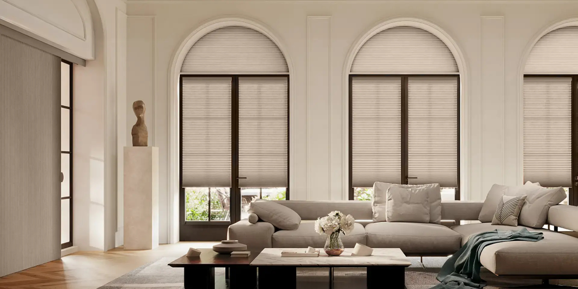 Hunter Douglas Duette® Cellular Shades as window coverings for arch windows in a living room