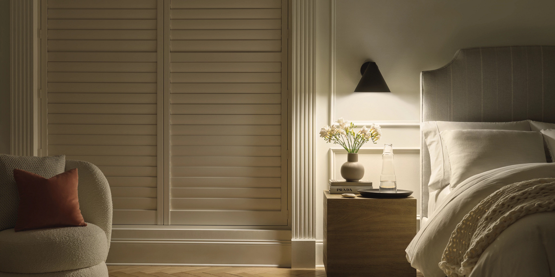 Properly fitted and installed Hunter Douglas custom shutters, creating a dark bedroom for sleep
