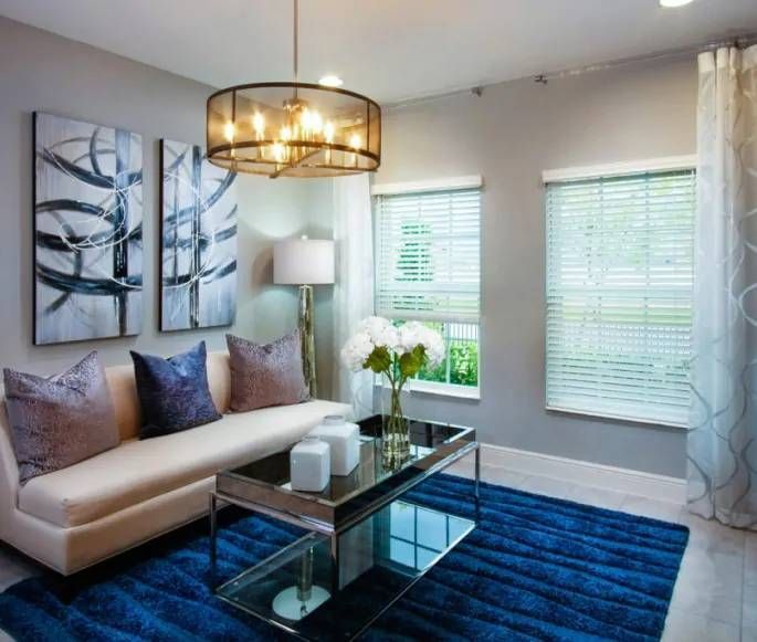 A Better Blind Faux Wood Blinds on two windows in a living room