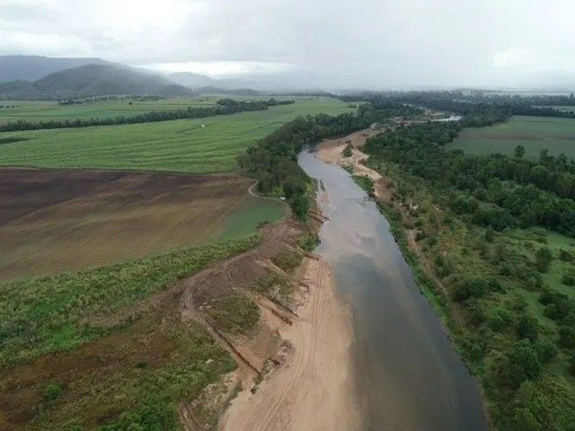 River Winding Through Fields and Trees — Macca's Dynamic Earthworks in Tolga, QLD