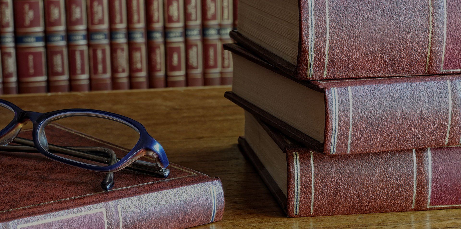Stack of Leather Books in Legal Office