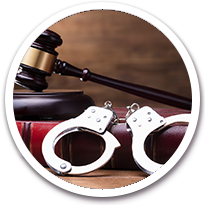 handcuffs next to a gavil