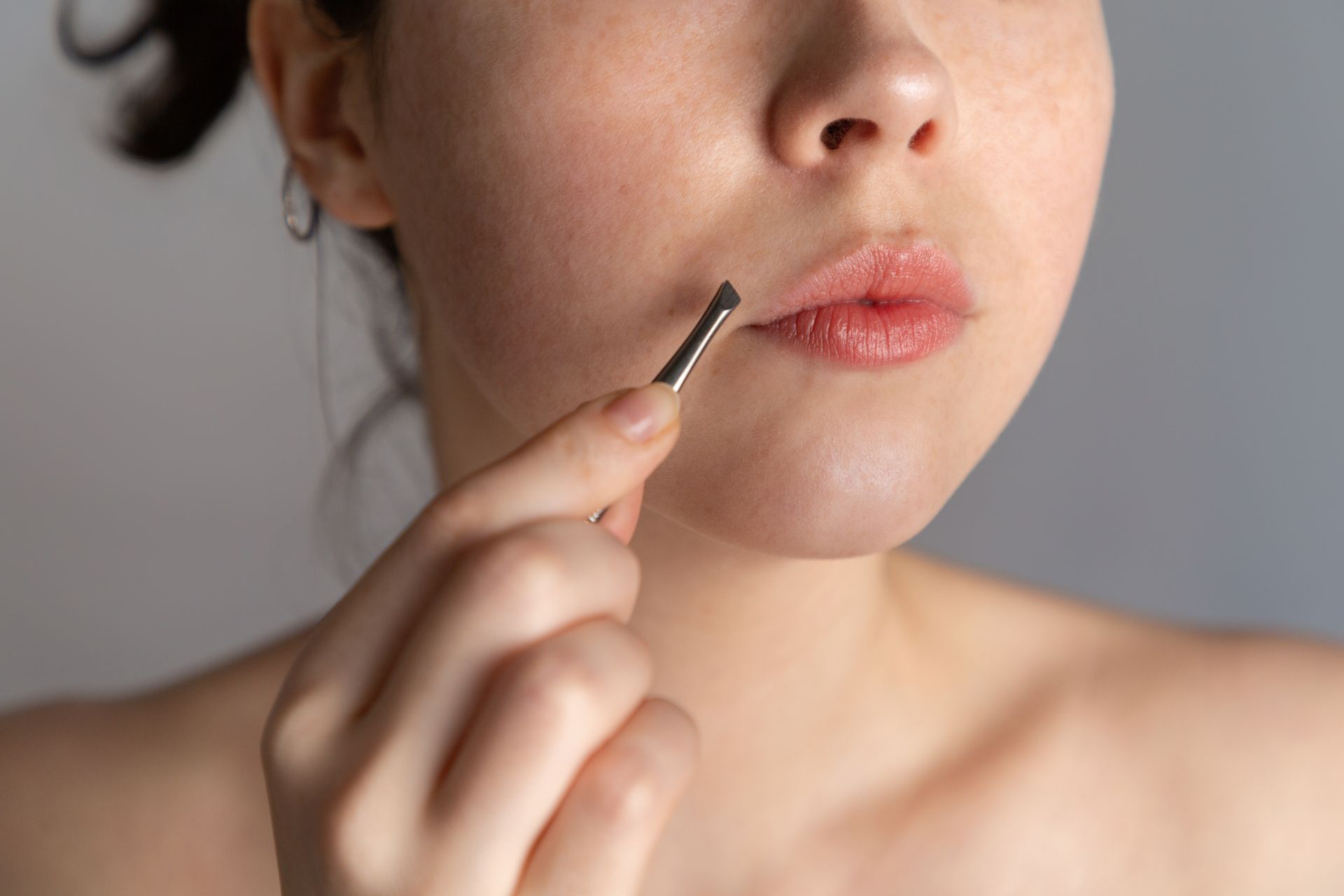 woman showing unwanted hair growth