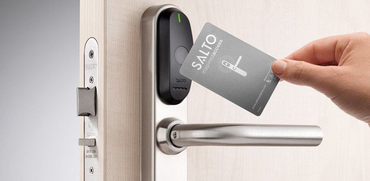 Person is Inserting a Card Into a Door Lock — KeyBay in Mittagong, NSW