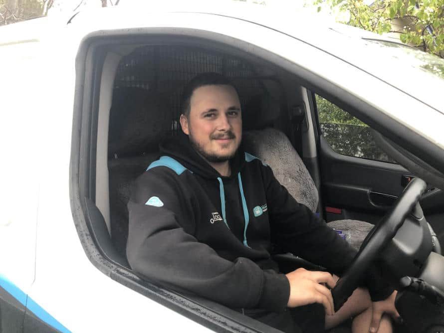 Man is Sitting in the Driver 's Seat of a White Van — KeyBay in Mittagong, NSW