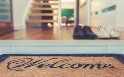 Welcome Mat With a Pair of Shoes on It in a Hallway — KeyBay in Mittagong, NSW