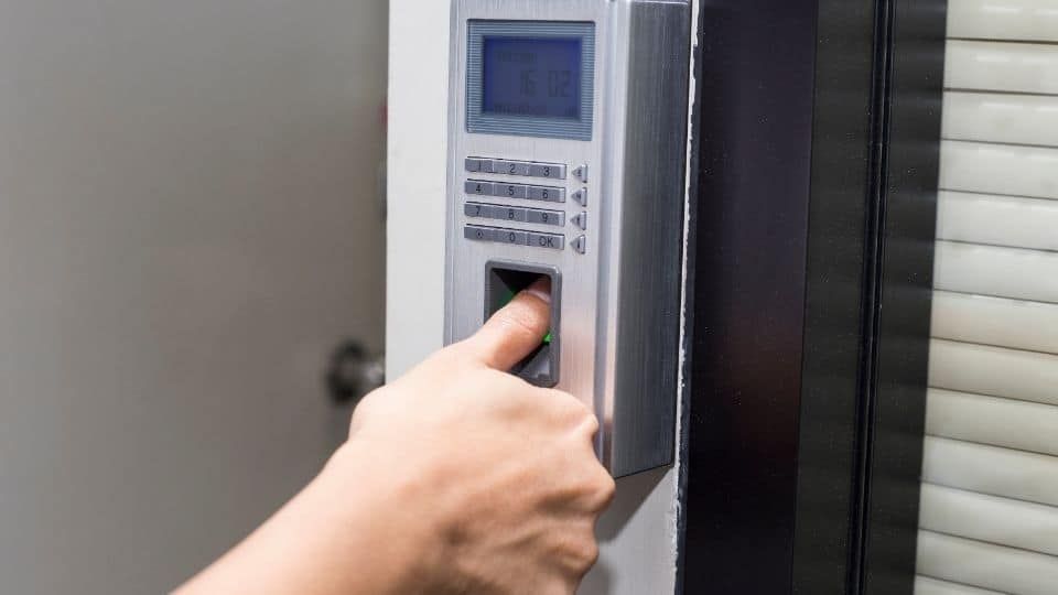 Person is Using a Fingerprint Scanner to Open a Door — KeyBay in Oran Park, NSW
