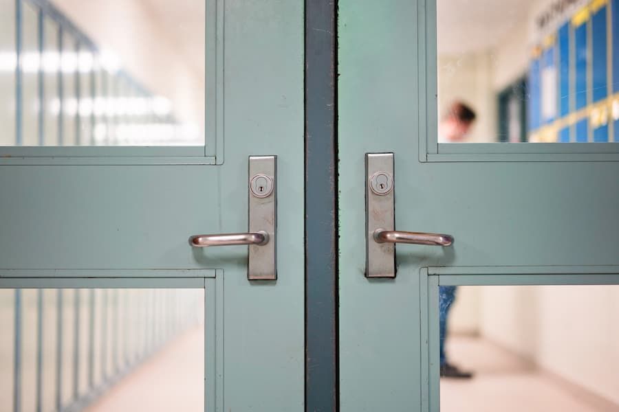 Person is Walking Down a Hallway Behind a Pair of Doors — KeyBay in Fitzroy Falls, NSW