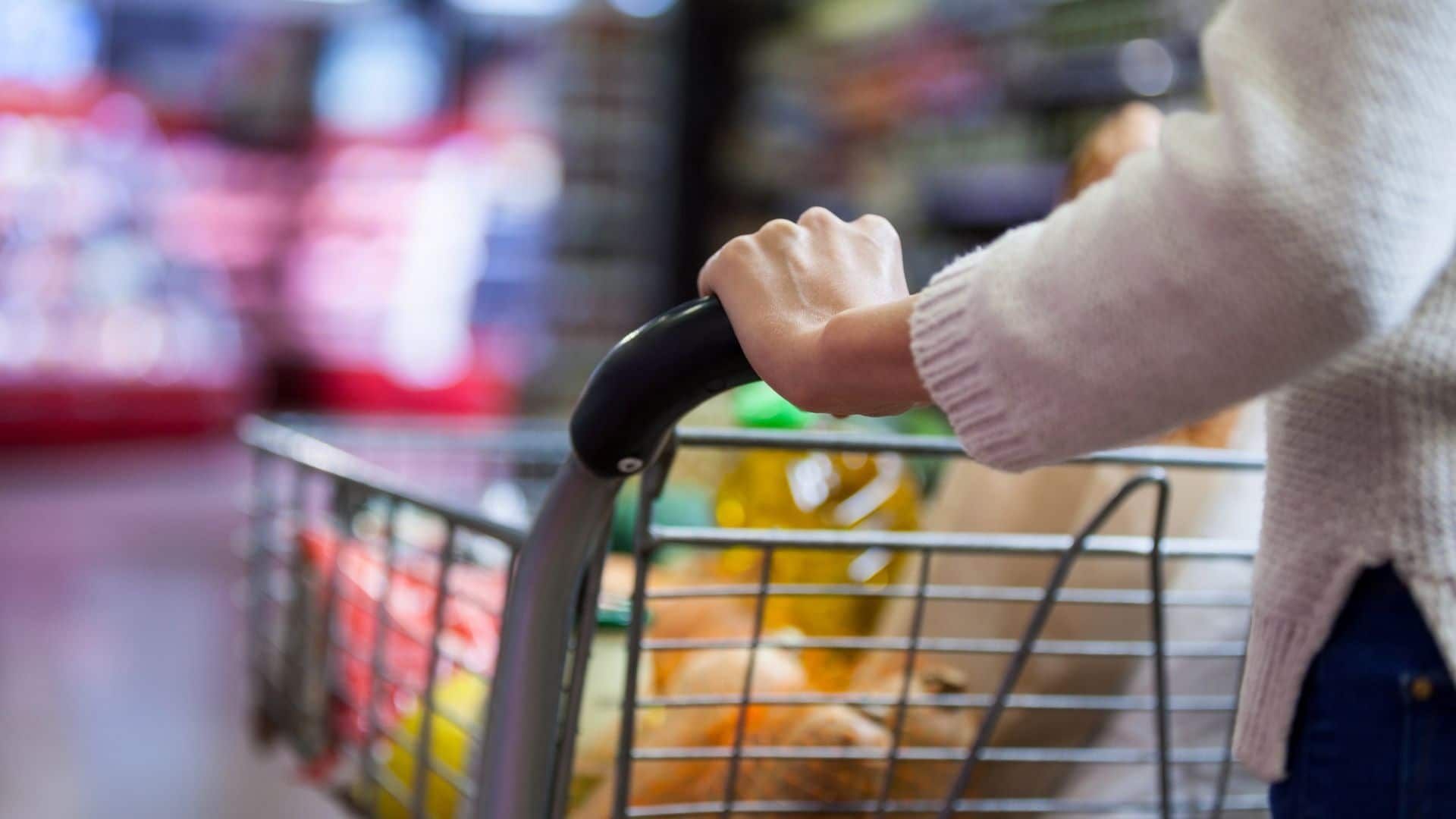 Woman is Pushing a Shopping Cart Full of Groceries in a Supermarketn — KeyBay in Harrington Park, NSW