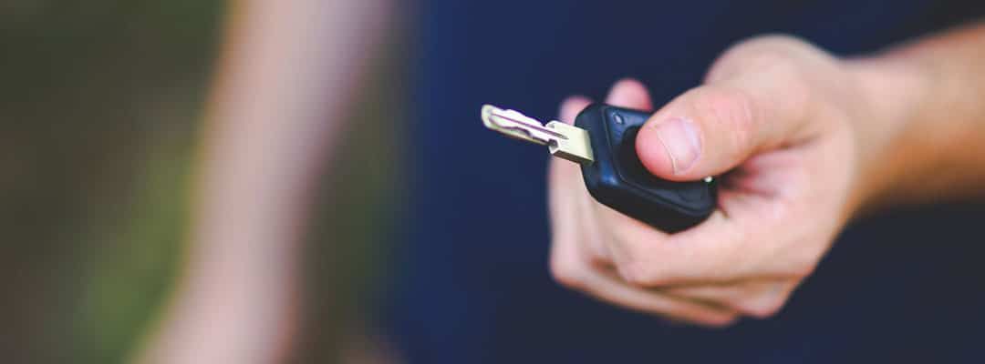 Person is Holding a Car Key in Their Hand — KeyBay in Appin, NSW