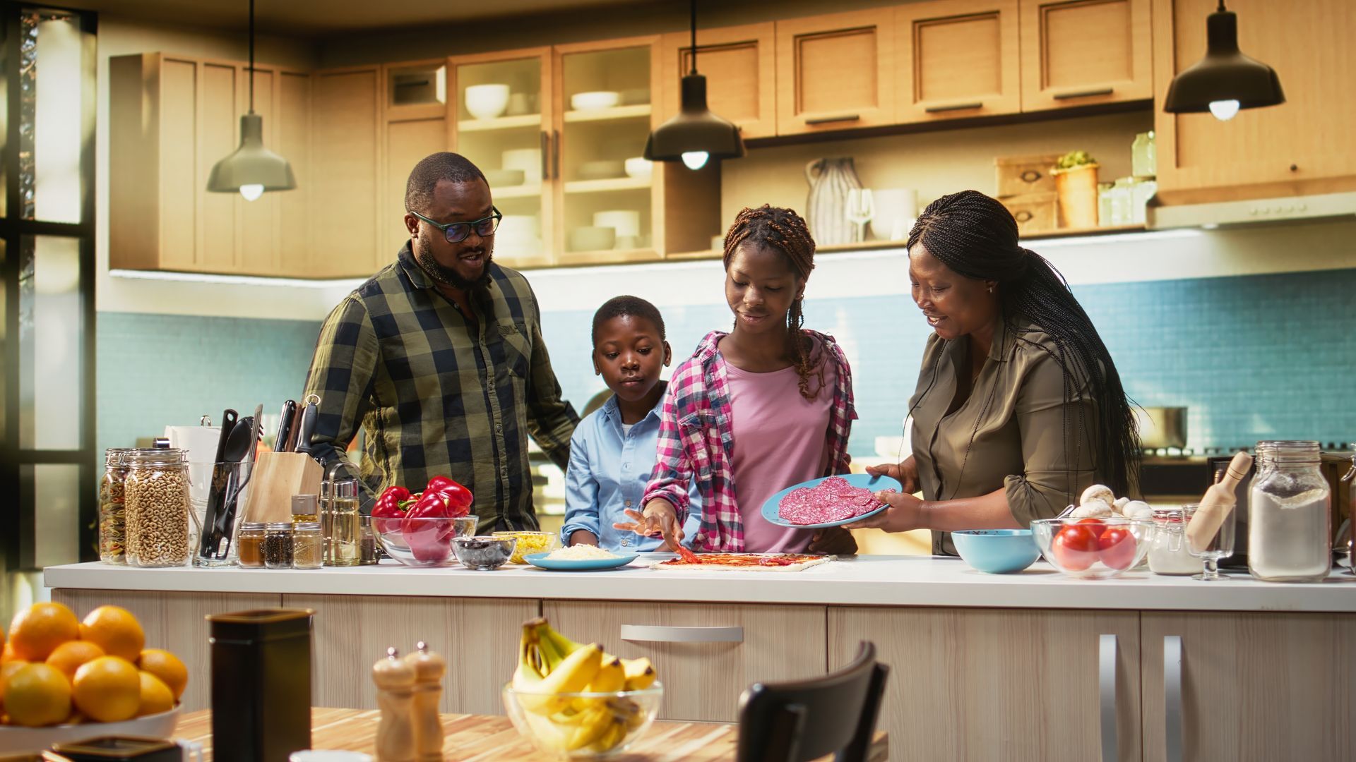 Family baking together in a bright kitchen, mixing ingredients at the counter