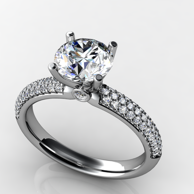 A white gold ring with a diamond in the center