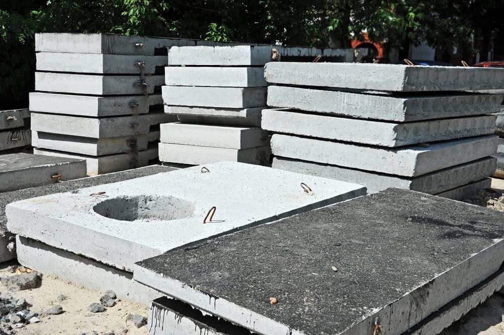 A Pile Of Concrete Slabs With A Hole In The Middle — Mascrete Pty Ltd In Hermit Park, QLD