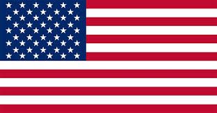 The american flag is red , white and blue with stars on it.