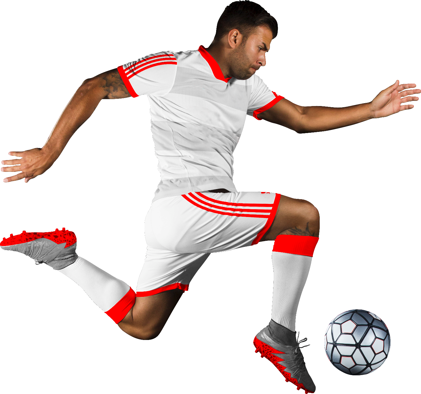 Soccer player in white uniform with red accents kicking a soccer ball.