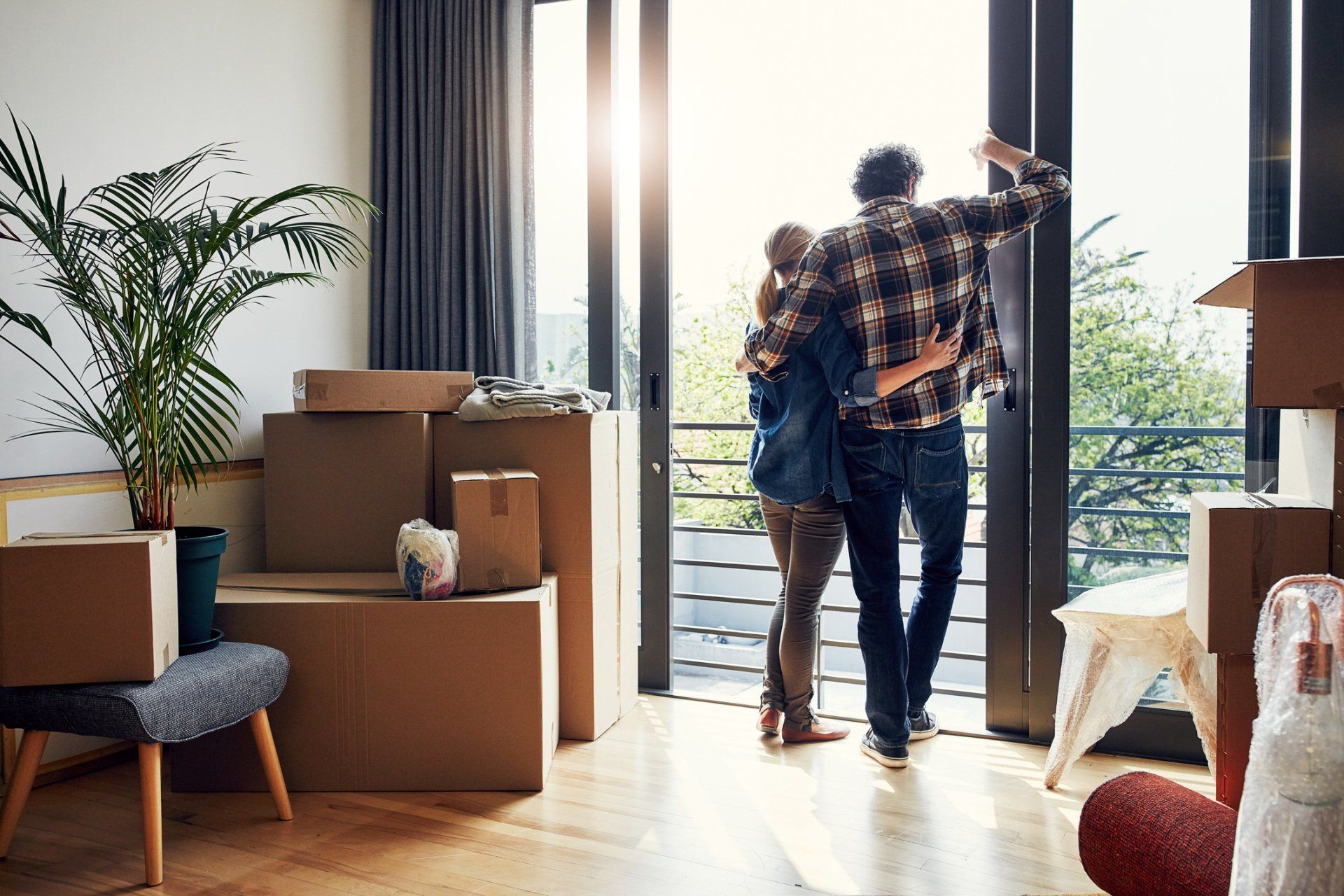 Couple Moving To Apartment — Portland, OR — All America Moving Couple using apartment moving services in Portland, OR
