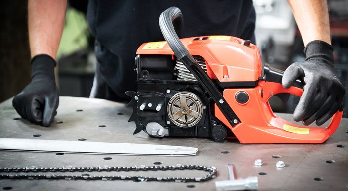 Auto Mechanic Working on Engine — Nitro, WV — Nitro Lawn Mower & Chain Saw Co Auto Mechanic Working on Engine — Nitro, WV — Nitro Lawn Mower & Chain Saw Co