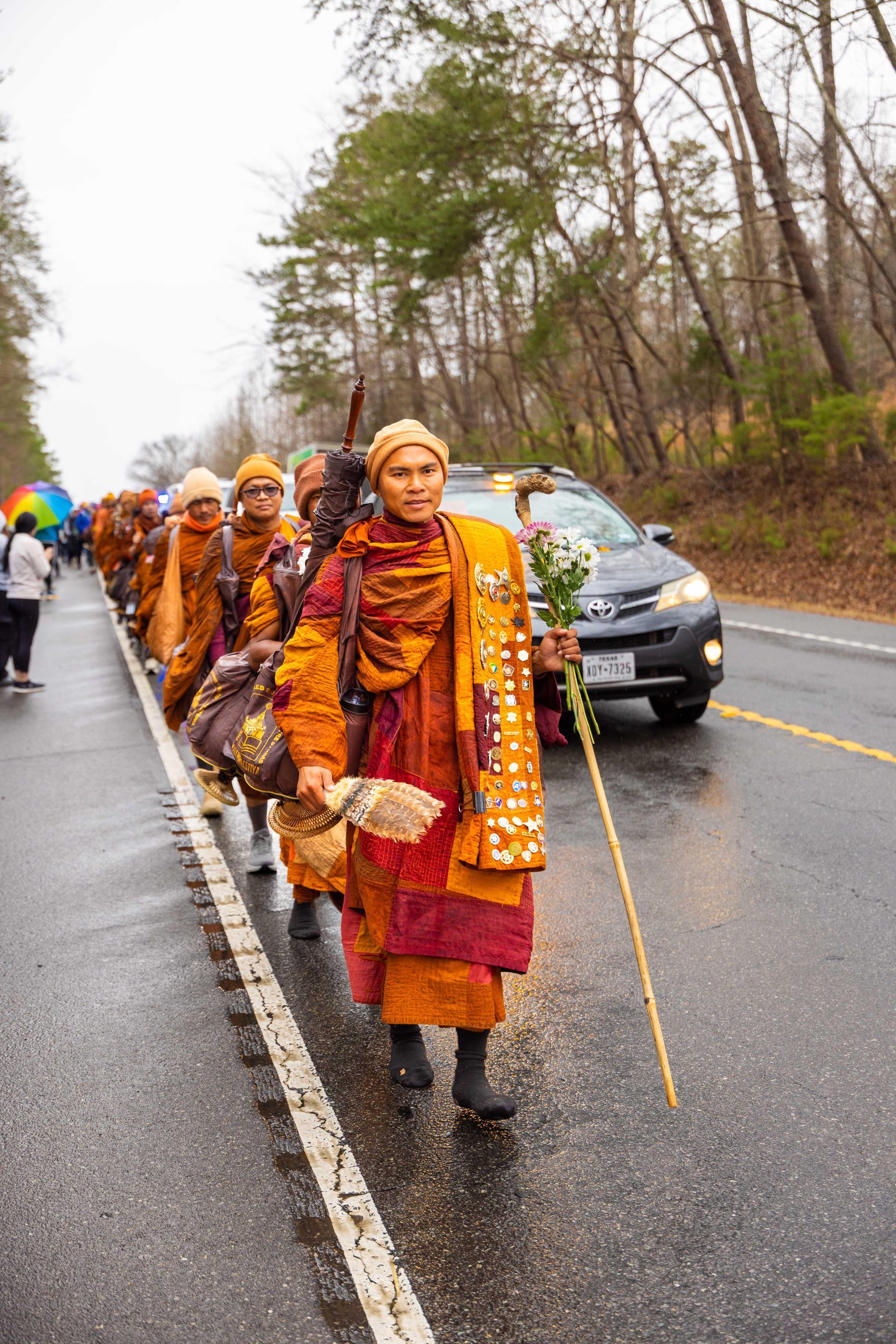 Buddhist monks walking during Charlotte Walk for Peace