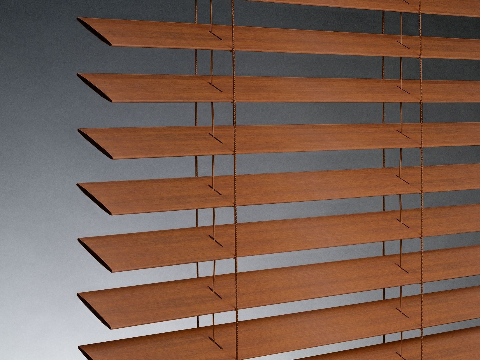 Brown window blinds against a light gray wall