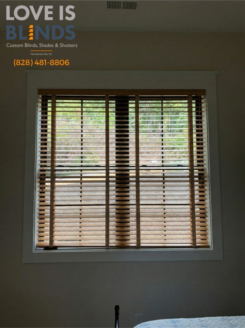 Window with wooden blinds and a 