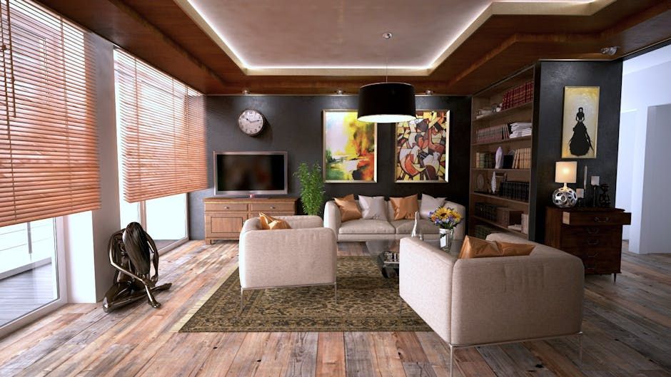 Modern living room with beige sofas, shag rug, wood walls, and large windows with blinds