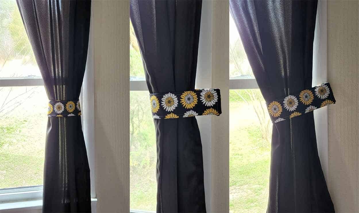 Dark curtains with sunflower tiebacks in front of a bright window
