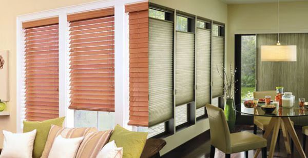 Interior with wood blinds on windows and sliding doors, in a bright living and dining area