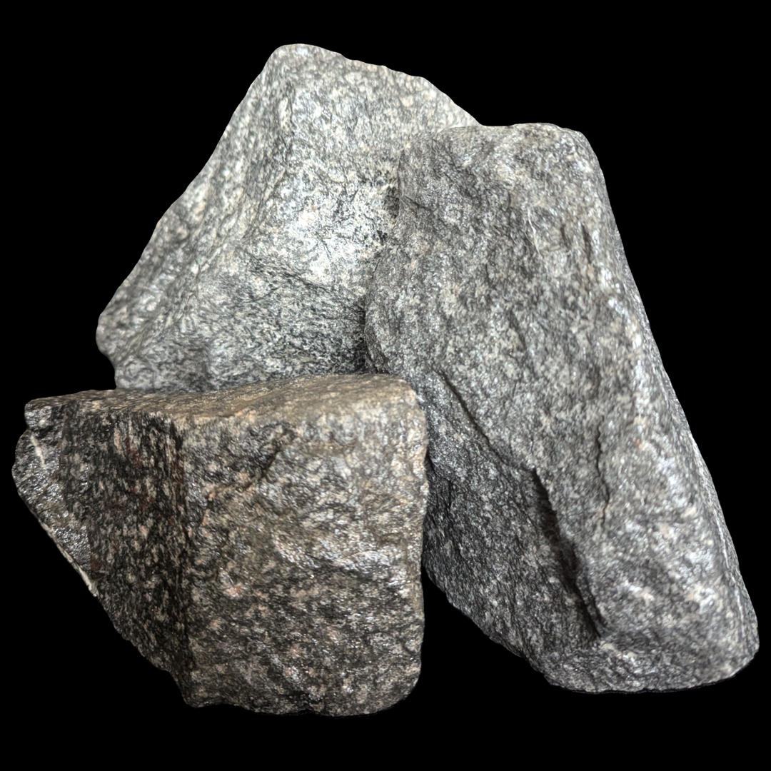 A pile of rocks stacked on top of each other on a black background