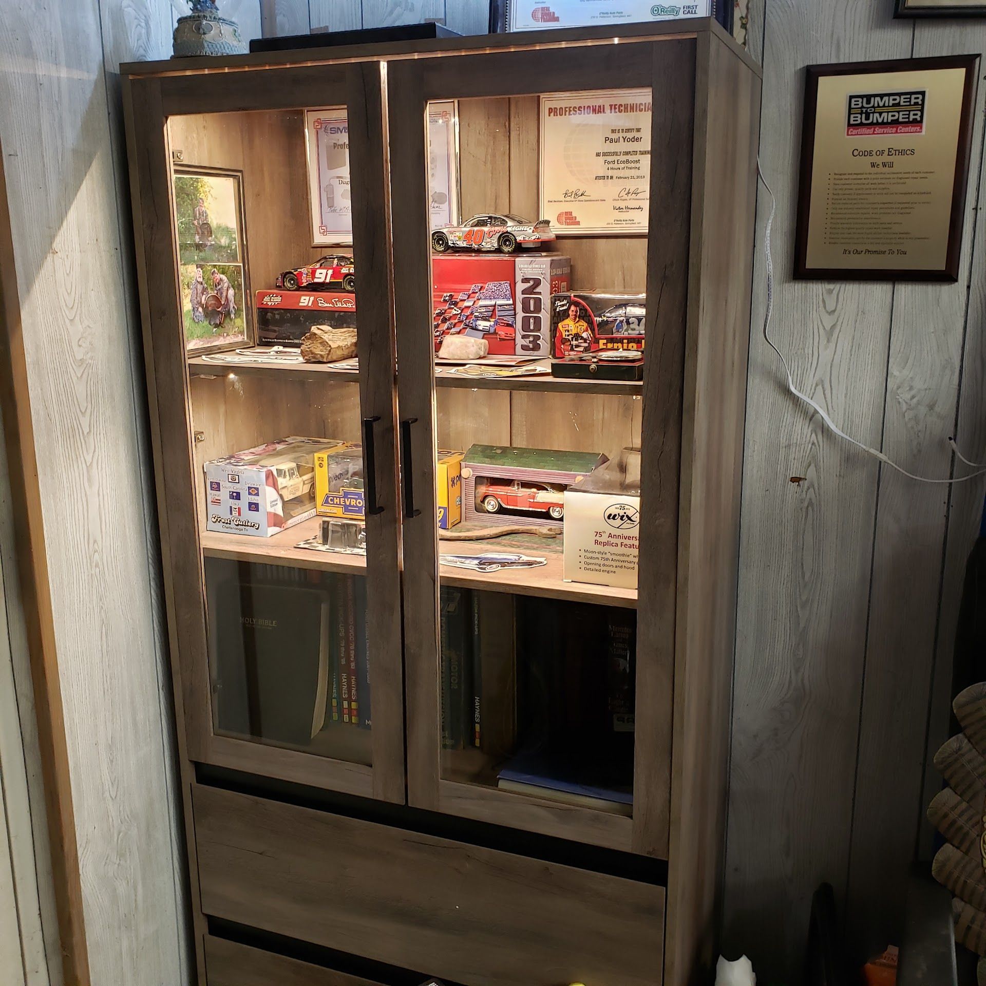 Automotive Parts And Product Display Cabinet Inside The Shop | Yoder's Auto Repair