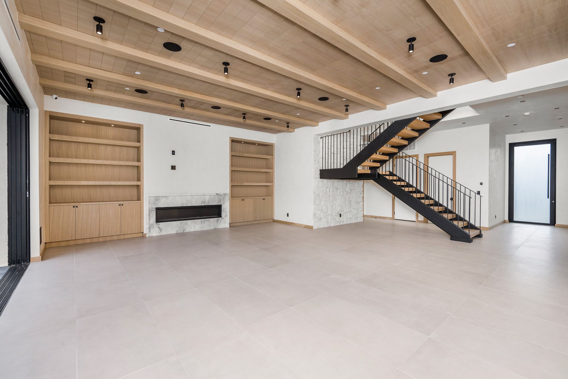 A basement with a wooden staircase and stairs