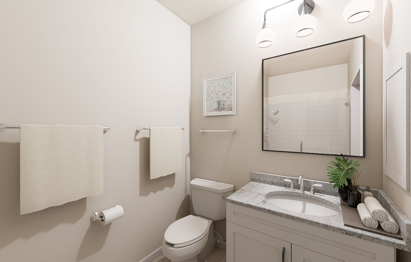 A neutral-toned bathroom featuring a vanity with a white countertop, mirror, toilet, and two hanging towels.