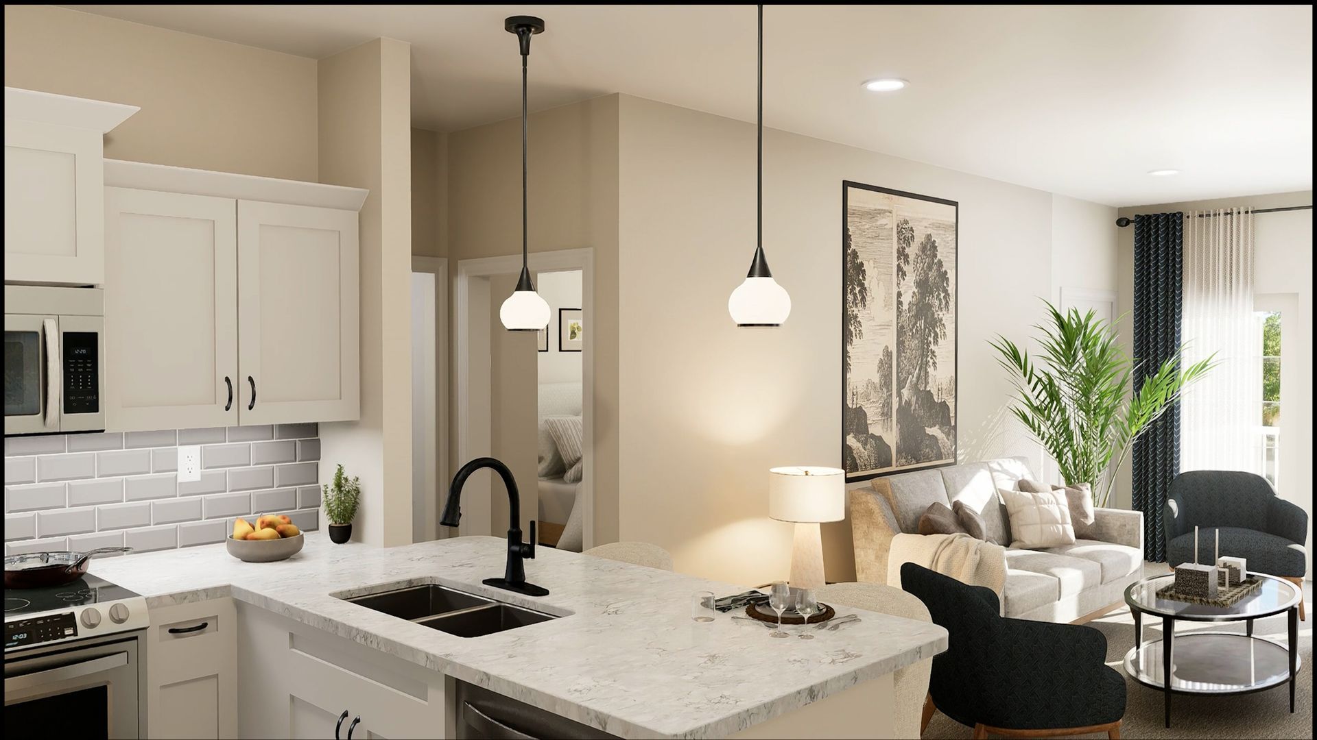 A modern open-plan kitchen and living room featuring white cabinetry, a marble-topped island, and a cozy seating area.