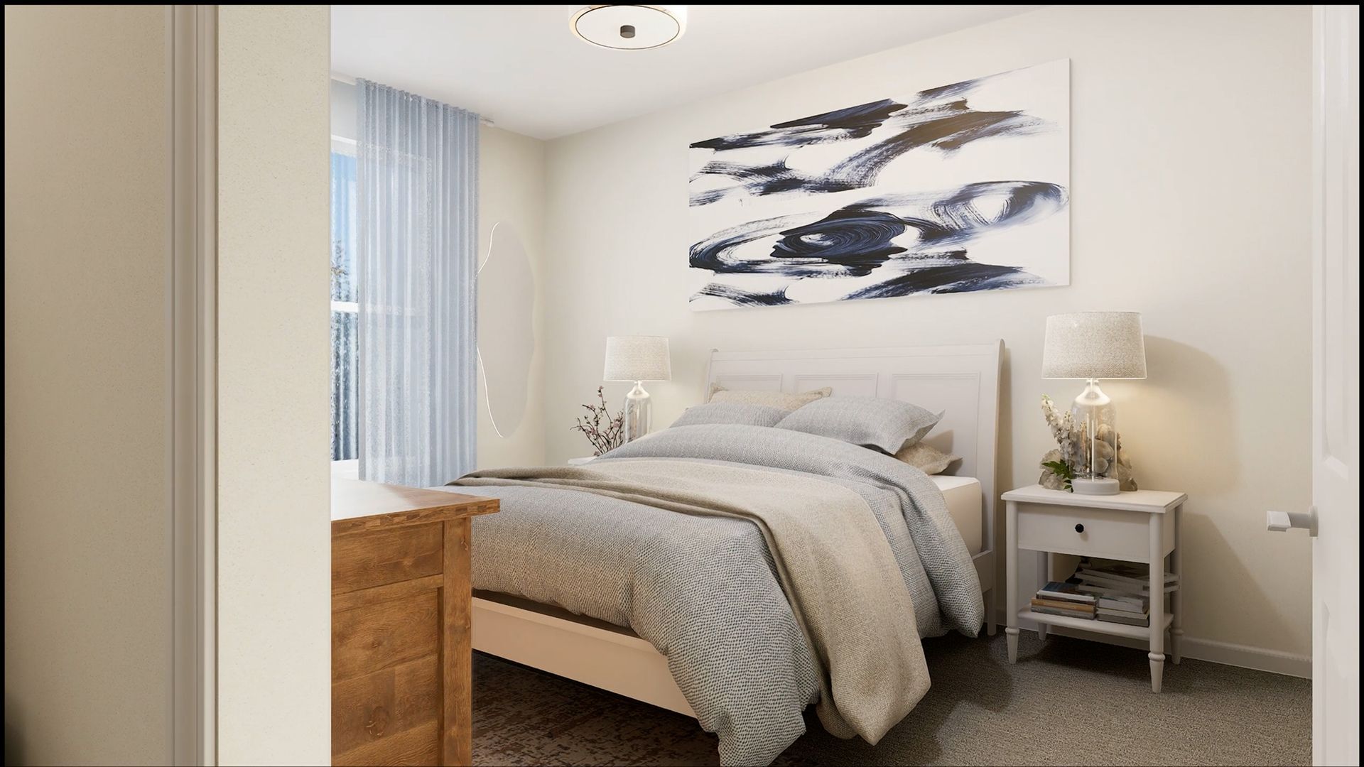 A bedroom features a queen bed with a patterned comforter, nightstands with lamps, and abstract art above the headboard.