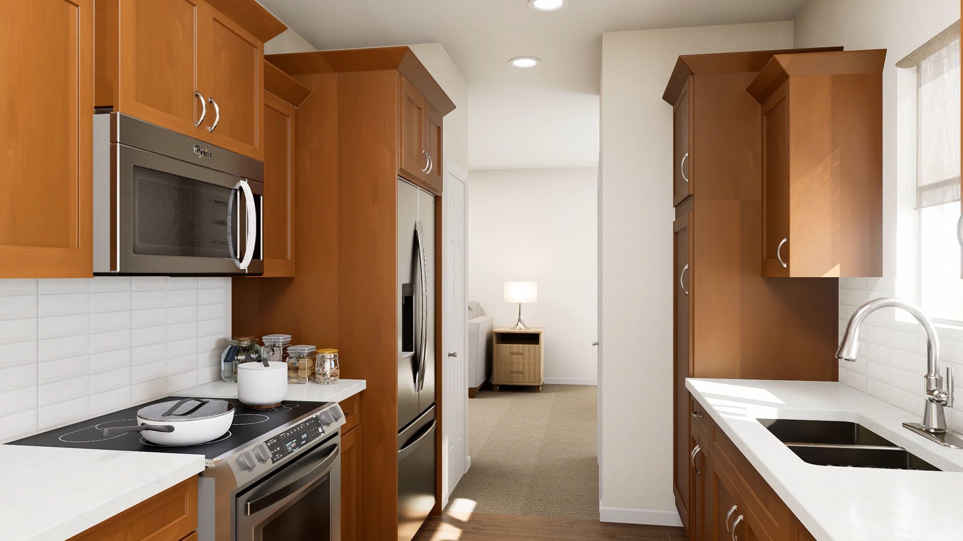 A modern kitchen with wood cabinets, stainless steel appliances, white countertops, and a view into a carpeted room.