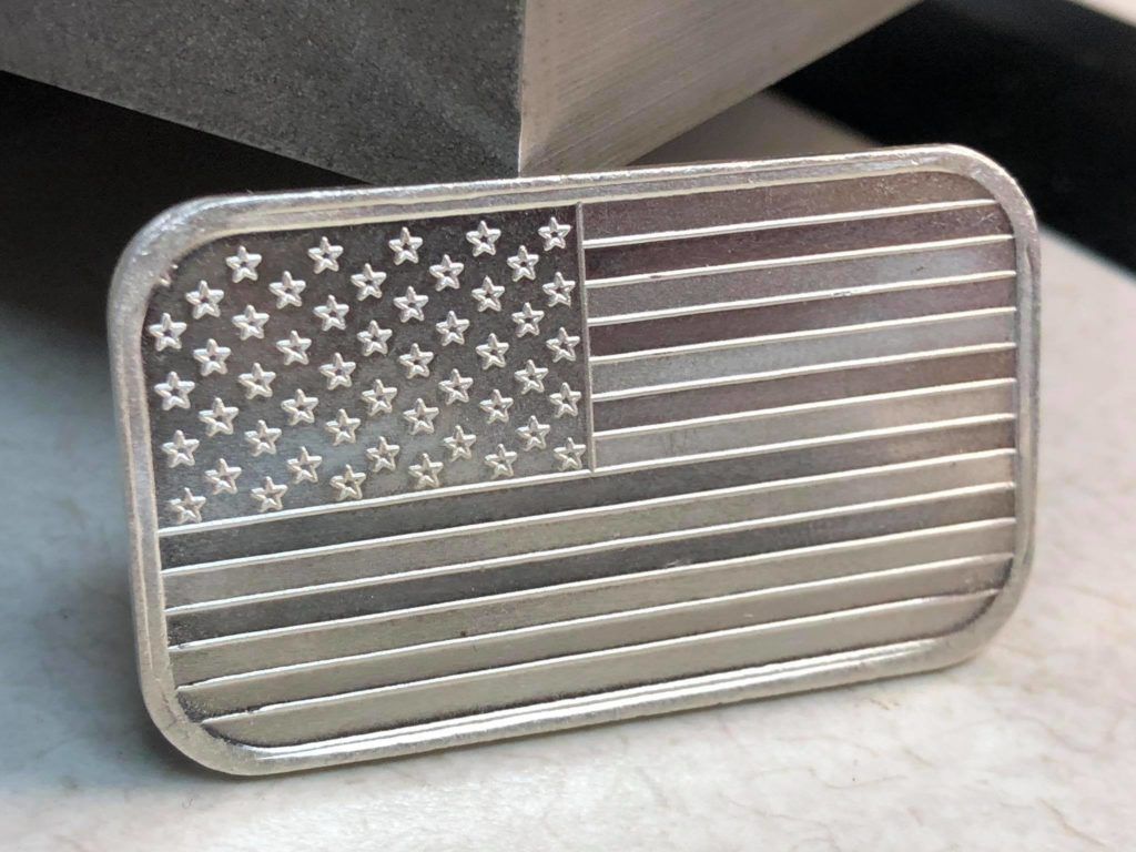 Silver American flag belt buckle with stars and stripes pattern
