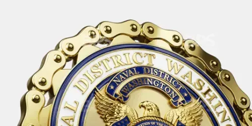 Close-up of a gold National District watermark seal with blue center text and Washington, D.C. details