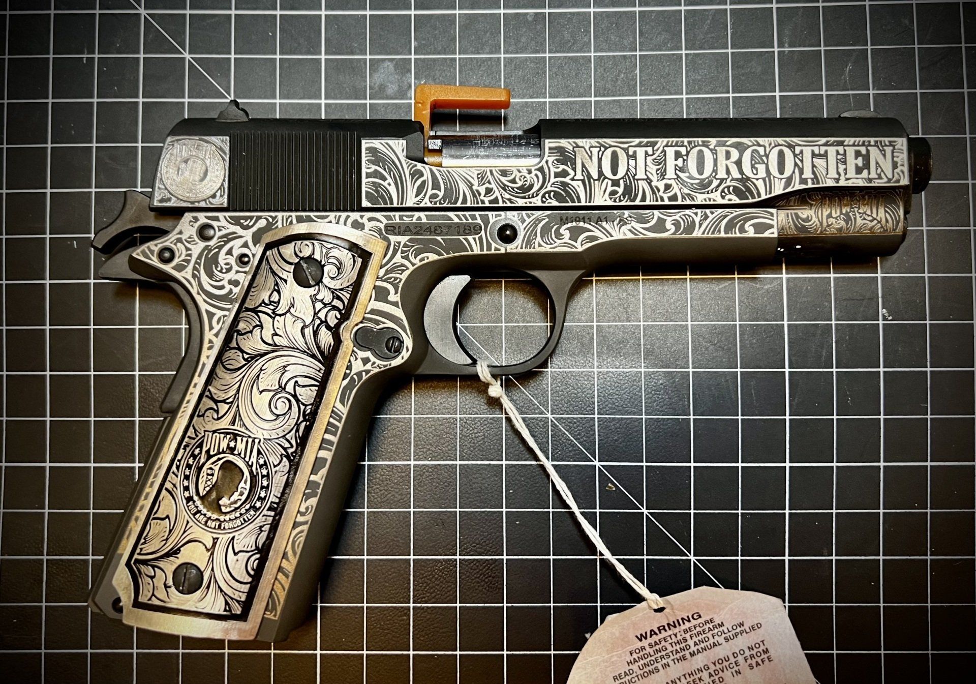 Engraved handgun with 