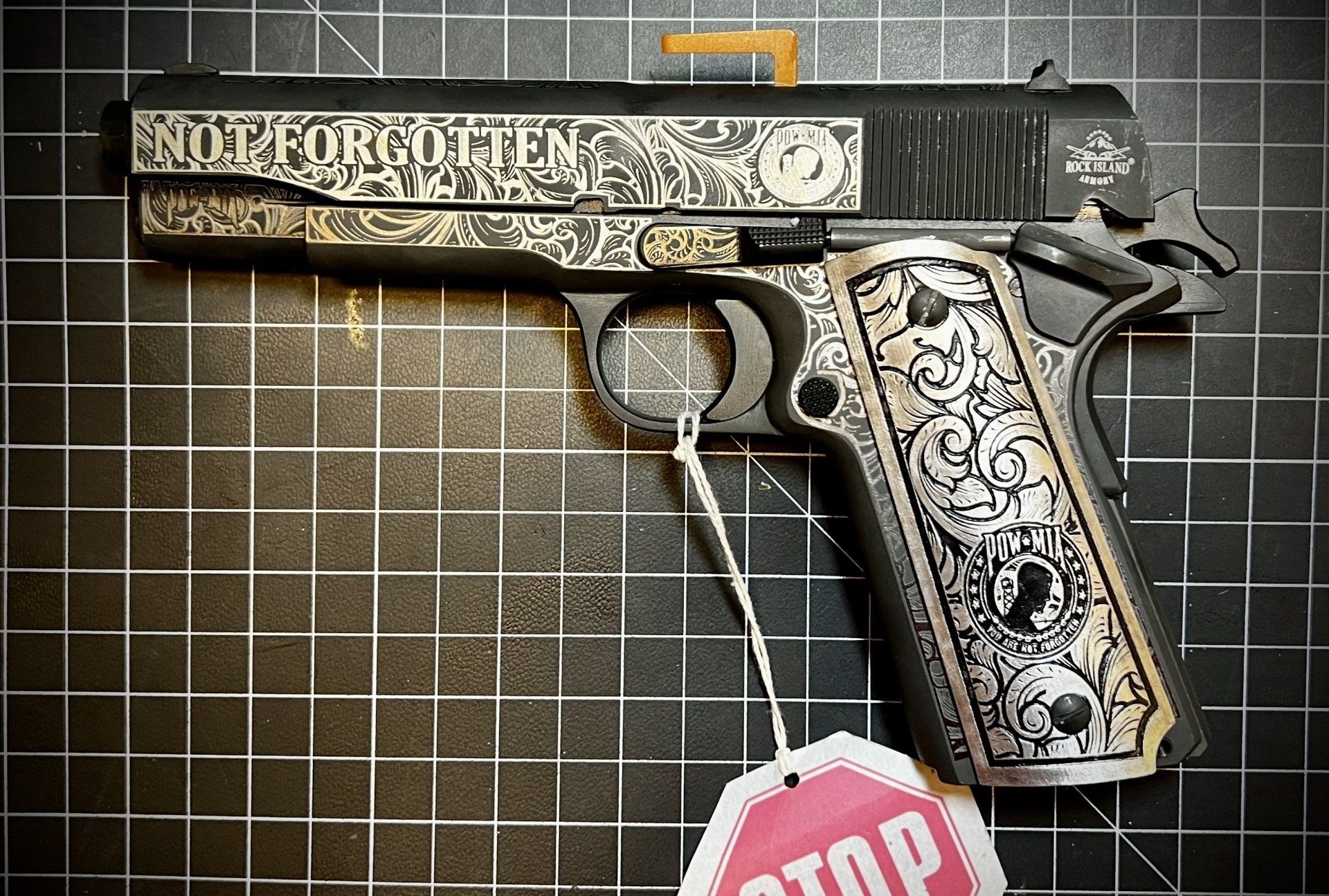 Engraved handgun with 