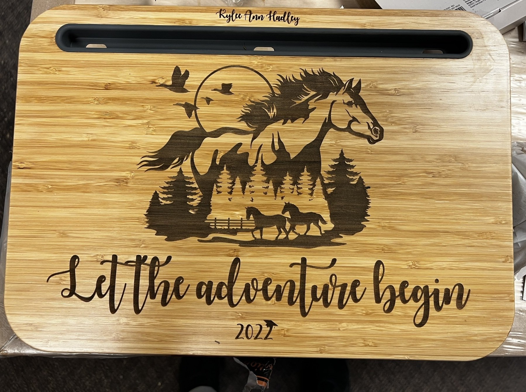 Wooden lap desk with engraved horse scene, text 