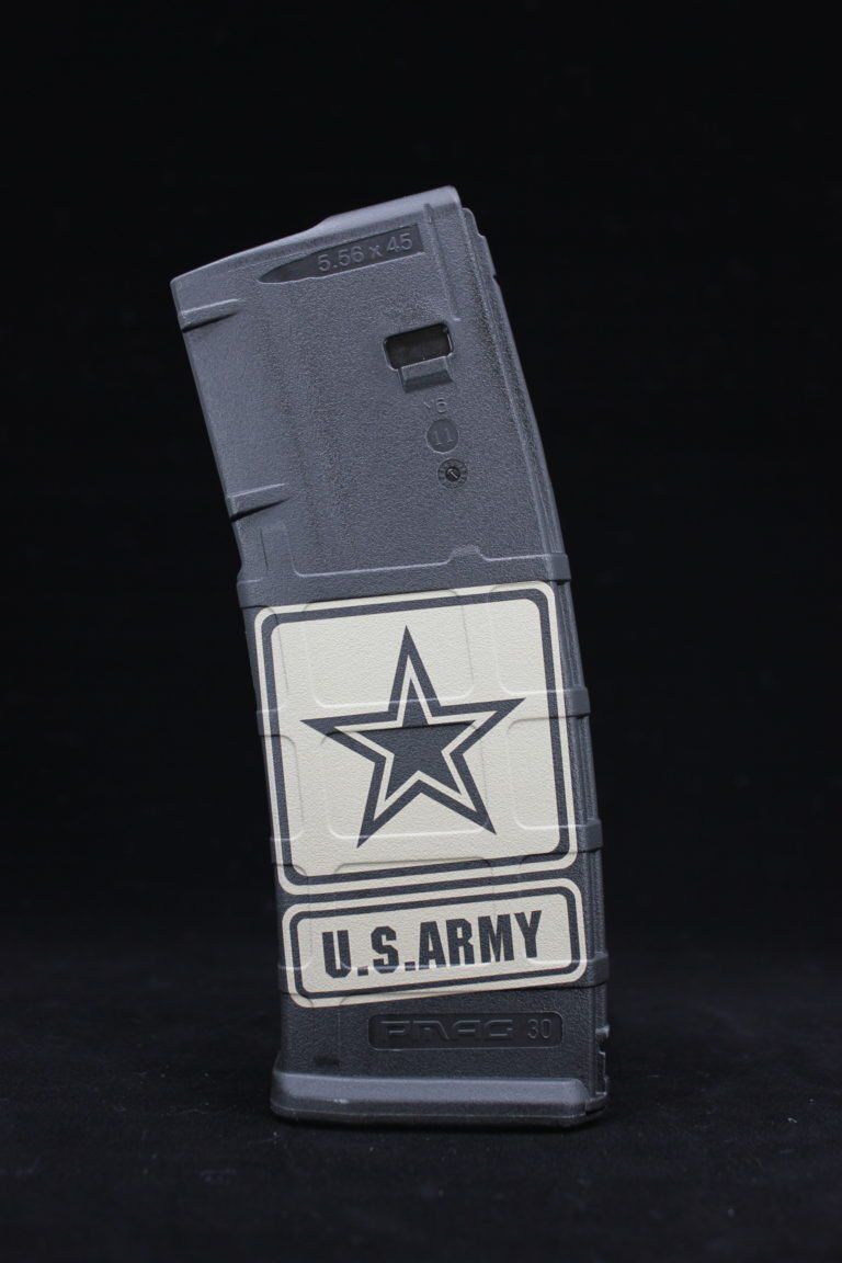 Gray magazine with U.S. Army star logo on a black background